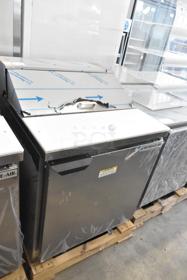 Beverage Air SPE27HC-B stainless steel commercial prep table with dented top, new condition, 115 volts, 1 phase.