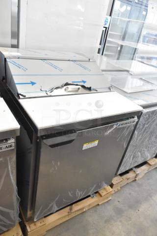 Beverage Air SPE27HC-B stainless steel commercial prep table with dented top, new condition, 115 volts, 1 phase.