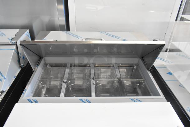 Beverage Air SPE27HC-B stainless steel sandwich prep table, new with scratch and dent. Mega top, 115 volts, 1 phase.