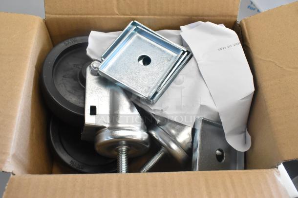 Box containing parts for Beverage Air SPE27HC-B prep table, including wheels and brackets. Suitable for assembly.