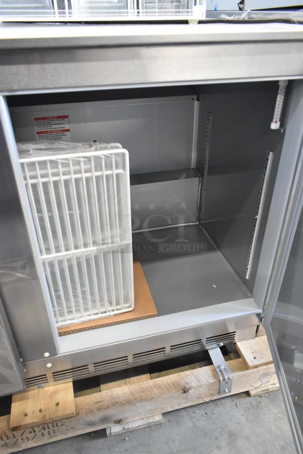 Beverage Air UCR48AHC-23 stainless steel undercounter cooler, 2 doors, 115V, brand new with scratches and dents, shelves inside.
