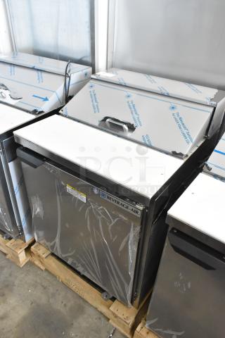 BRAND NEW Beverage Air SPE27HC-B stainless steel sandwich prep table, 115V, visible packaging, minor dents, auction item.