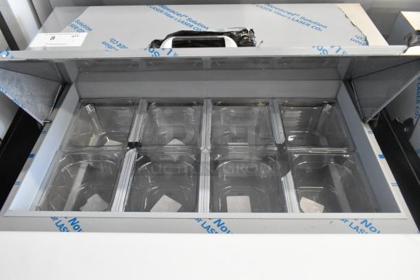 BRAND NEW Beverage Air SPE27HC-B stainless steel sandwich salad prep table, bain marie mega top, 115V, 1 phase, shown with compartments open.