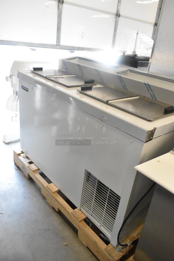 Brand new Master-Bilt FLR-80 54" ice cream topping unit with refrigerated base, 115V, 1 phase, minor scratches, metal exterior.