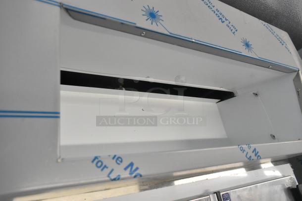 Brand new Master-Bilt FLR-80 54" ice cream topping unit with refrigerated base, scratch and dent condition, 115V, 1 Phase.