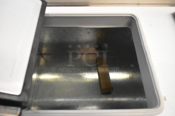 Brand new Master-Bilt FLR-80 54" ice cream topping unit with refrigerated base; scratch and dent condition.