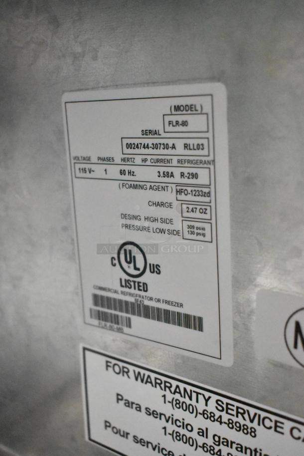 Label close-up of Master-Bilt FLR-80 commercial ice cream topping unit. Shows model, voltage (115V), and UL listing.