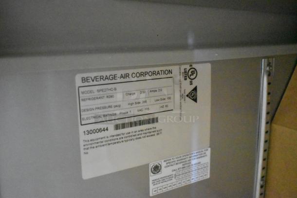 Beverage Air SPE27HC-B label on stainless steel commercial sandwich salad prep table, 115V, 1 phase, brand new scratch and dent.
