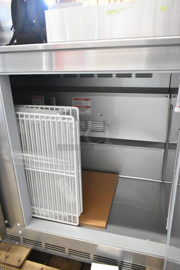 Brand new Beverage Air UCR48AHC-23 stainless steel undercounter cooler with two doors, 115V, 1 phase, interior view showing shelving.