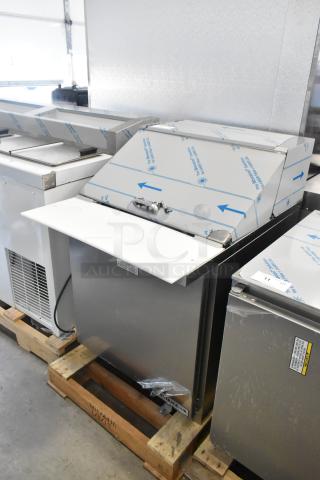 Brand new Beverage Air SPE27HC-12M stainless steel prep table, 115V. Scratch and dent condition. Protective film visible.