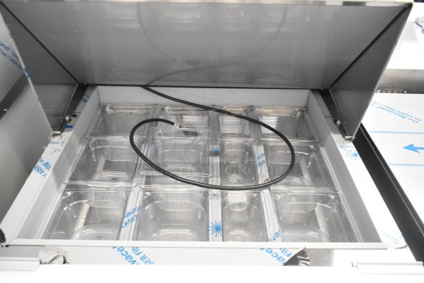 Beverage Air SPE27HC-12M stainless steel sandwich prep table, brand new with minor scratches, 115V, bain marie top.