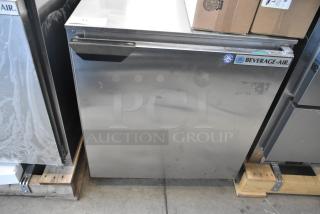 BRAND NEW Beverage Air UCR27AHC stainless steel commercial cooler, single door, visible dent, 115V, 1 phase, model label shown.