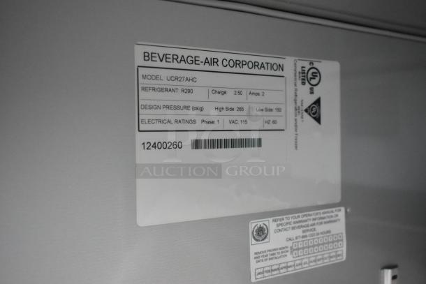 BRAND NEW Beverage Air UCR27AHC cooler label, showing model, refrigerant type, design pressure, and electrical ratings.