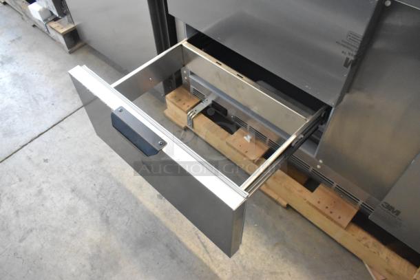 Beverage Air UCFD60AHC-2 undercounter freezer with open drawer, stainless steel, scratch and dent, 115 volts, 1 phase.