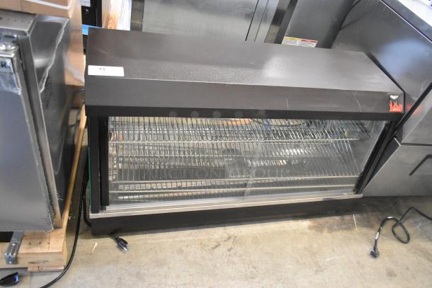 BRAND NEW Vollrath Cayenne FMA7048 40735 metal commercial heated display case. 115V, 1 phase. Scratch and dent condition.