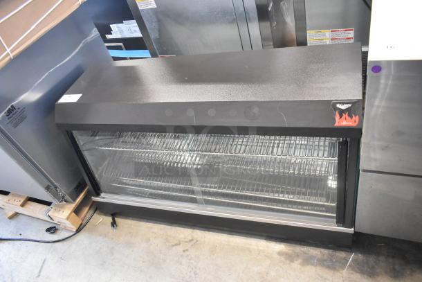 Brand new Vollrath Cayenne FMA7048 heated display case, 115V, 1 phase, metal body, visible scratch and dent.