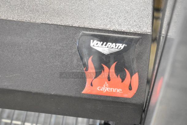 Brand new Vollrath Cayenne FMA7048 display case. Metal, countertop design. Visible Vollrath logo and model markings. 115V, 1 Phase.