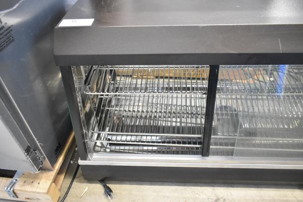 Vollrath Cayenne FMA7048 heated display case, metal, countertop model, brand new with minor scratches. 115V, 1 Phase.