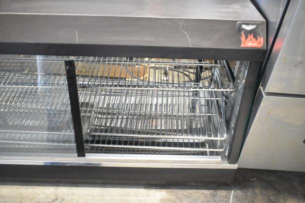 BRAND NEW Vollrath Cayenne FMA7048 heated display case, metal, commercial countertop, 115 volts, with light cosmetic scratches.