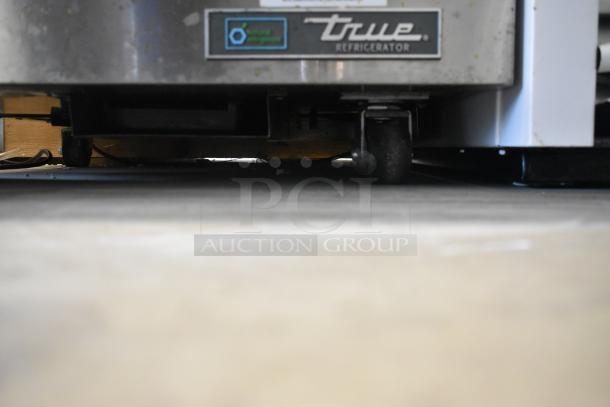 Brand new 2020 True TUC-27D-2-HC stainless steel 2-drawer undercounter cooler, with visible True logo and caster wheels.