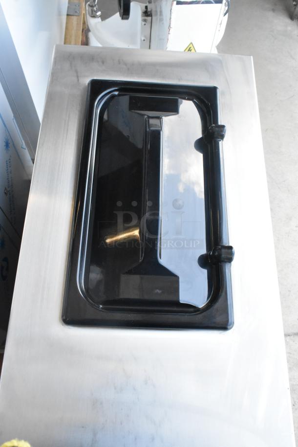 Brand new Spaceman 6450-CL stainless steel frozen beverage machine, single flavor, 110V, 1 phase, minor scratches.