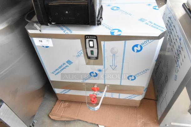 BRAND NEW 2024 Fetco HWB-25 Stainless Steel Hot Water Dispenser, 25 Gallon, 3 Phase, with slight dent, tags visible.