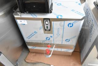BRAND NEW 2024 Fetco HWB-25 Stainless Steel Hot Water Dispenser, 25 Gallon, 3 Phase, with slight dent, tags visible.