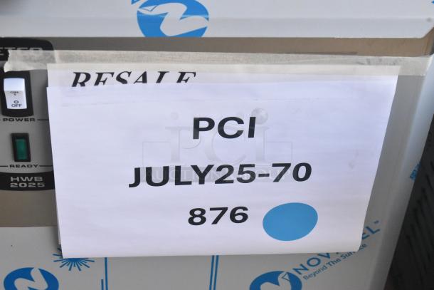 Brand new 2024 Fetco HWB-25 stainless steel hot water dispenser, 25-gallon. Labels show model HWB-2025, resale, and PCI code.
