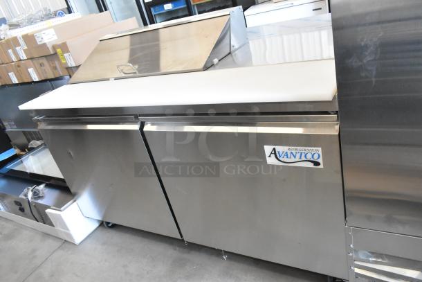 Brand new Avantco 178SSPT6010 stainless steel refrigerated sandwich prep table, two doors, on casters, minor dents visible.