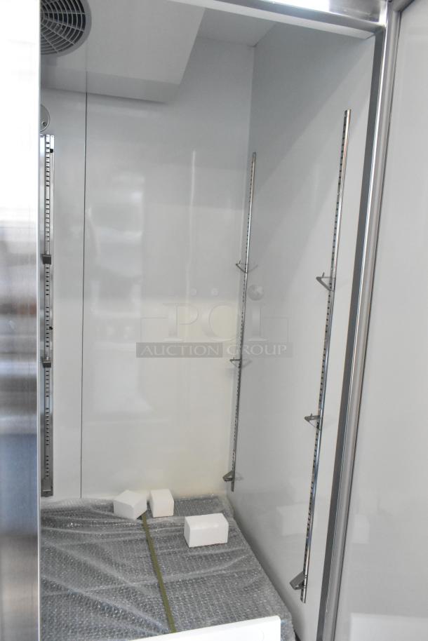 Stainless steel 2-door cooler, Mainstreet 829BMR49R, new scratch and dent, poly-coated racks, commercial casters, 115V.