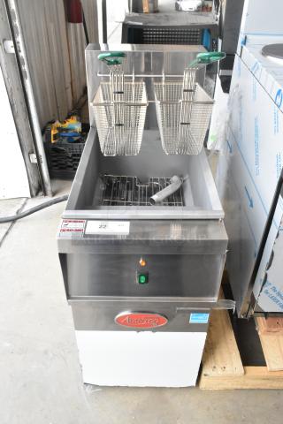 Brand new Avantco 177EF40B stainless steel commercial deep fat fryer with two metal fry baskets, 208V, 1 phase.