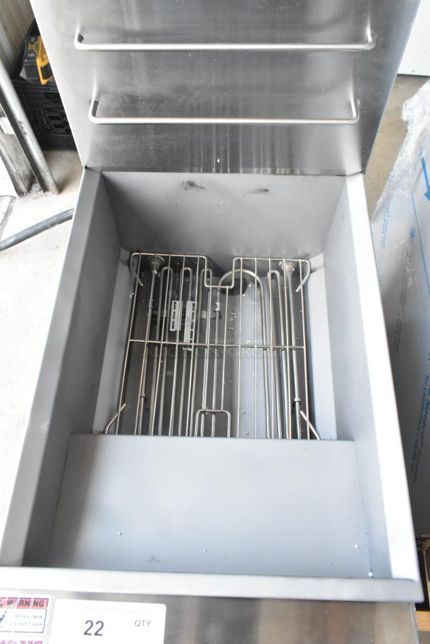 Brand new Avantco 177EF40B stainless steel commercial deep fat fryer, 208V, with scratch and dent, includes 2 metal baskets.