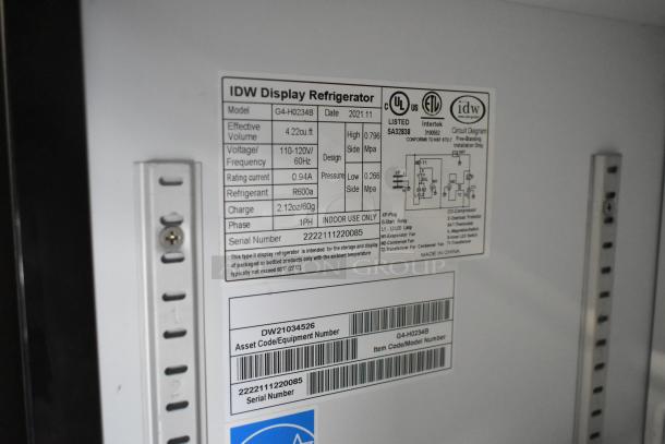 IDW G4-H0234B cooler label showing model, voltage, refrigerant type, and serial number for 2021 commercial use.