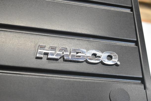 2019 Habco SE18 commercial cooler with poly-coated racks, 115V, 1 phase. Features metal construction and single door.