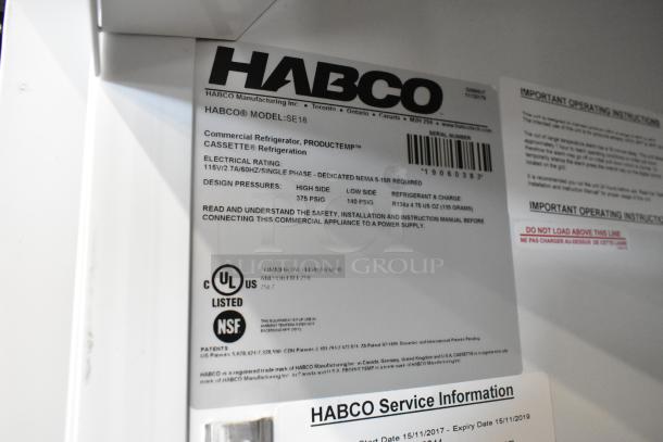 2019 Habco SE18 metal cooler merchandiser, single door, poly coated racks, 115V, 1 phase, labels show electrical and safety info.