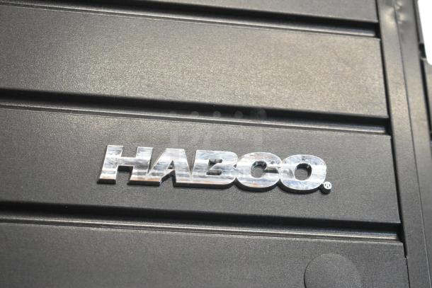 2019 Habco SE18 metal commercial cooler, single door, 115V, with poly coated racks. Visible Habco logo. Broken glass mentioned.