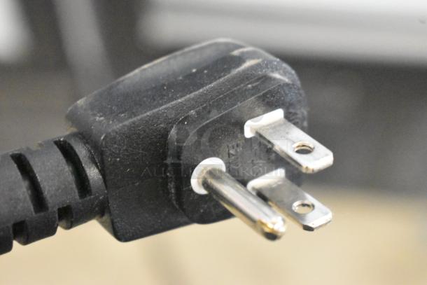 Close-up of a standard 115-volt electrical plug for the 2019 Habco SE18 cooler merchandiser.
