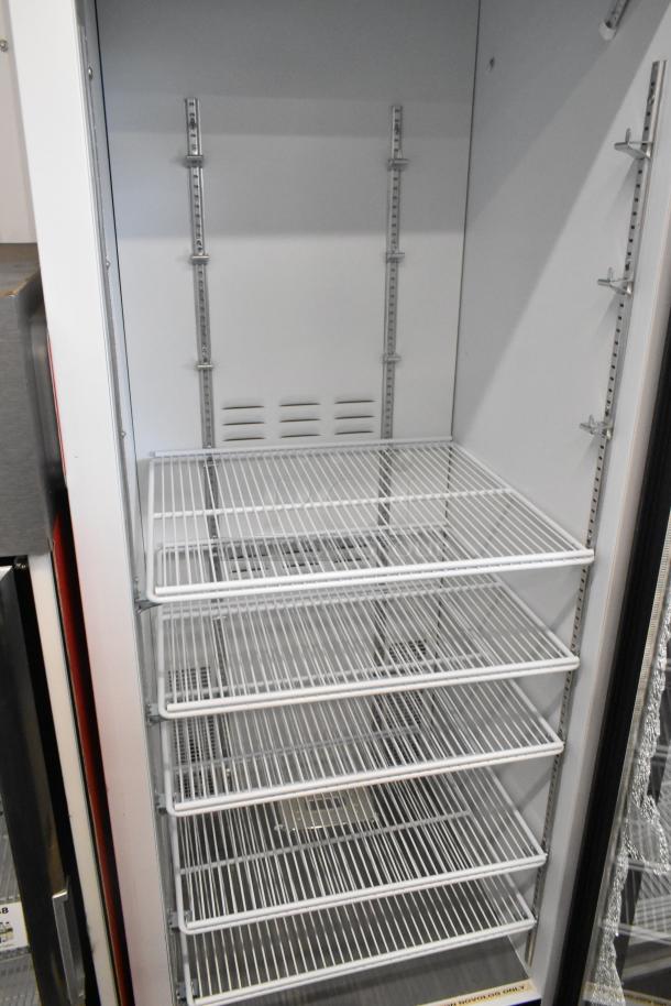 2019 Habco SE18 single door commercial cooler with poly coated racks, visible broken glass, 115V, single phase.