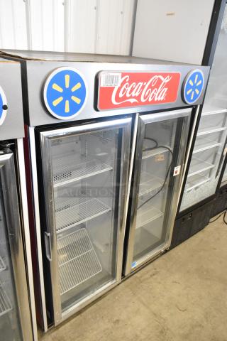 2023 IDW G-4SI-N-2-3-4-B-5 2-door cooler merchandiser with poly-coated racks, 115V, features Coca-Cola branding.