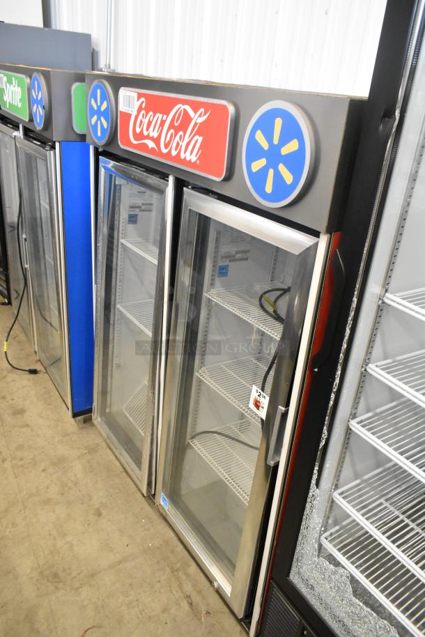 2023 IDW G-4SI-N-2-3-4-B-5 2 Door Reach In Cooler, poly-coated racks, 115V, features Coca-Cola branding, excellent condition.