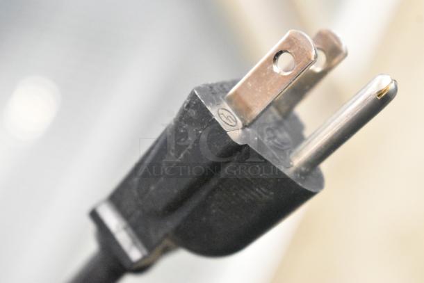 Close-up of a power plug for the 2023 IDW G-4SI-N-2-3-4-B-5 commercial cooler. 115V, 1 phase.