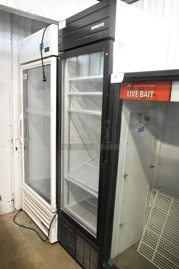 2019 Habco SE18 metal single door cooler merchandiser with poly coated racks. Features 115 volts, 1 phase. Well-maintained.