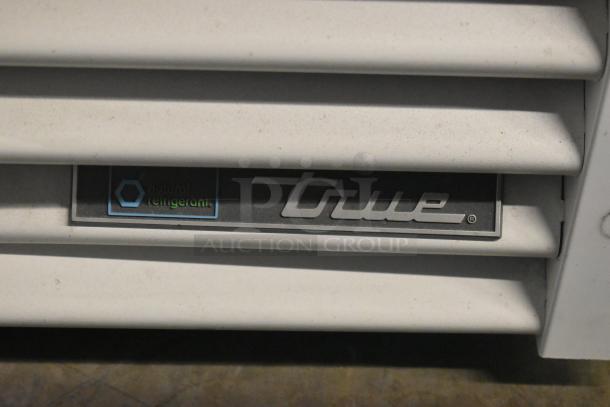 True TSCI-600R-G-PH metal reach-in cooler with a "Natural Refrigerant" label, single door, poly-coated racks, 115V, 1 phase.