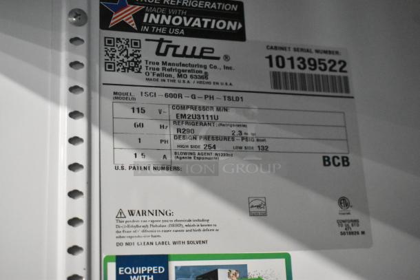 2021 True TSCI-600R-G-PH commercial cooler, single door, 115V, 1 phase, metal, poly-coated racks, label details.