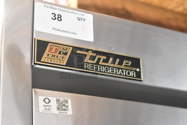 True T-35 Stainless Steel 2-Door Reach-In Cooler, commercial grade, 115V, 1 phase. Visible labels suggest great condition.