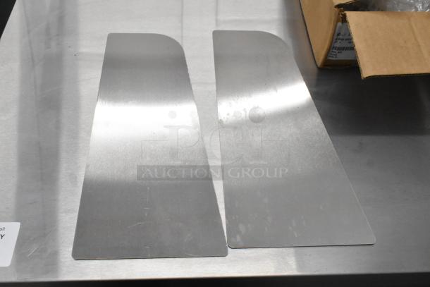 Lot of 2 brand new metal panels with minor scratches and dents, rectangular shape, silver finish, in open box.