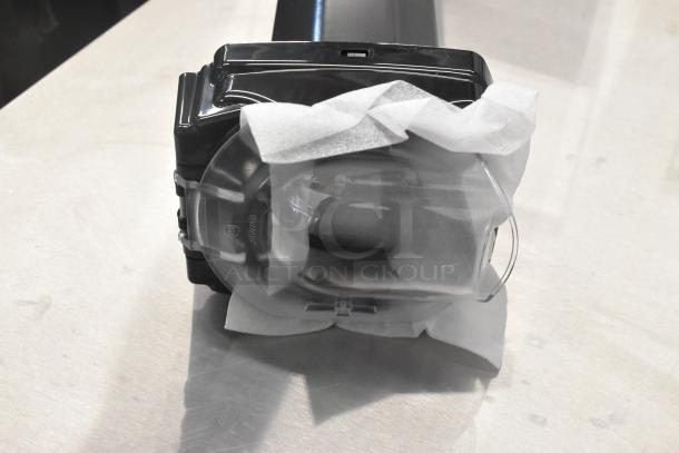 Brand new Vollrath LS03IB-AC LidSaver™ 3 in-counter dispenser for 3 1/4"-3 3/4" lids, wrapped in protective covering.