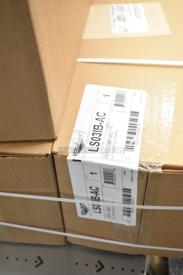 4 brand new Vollrath LS03IB-AC LidSaver™ 3 in-counter lid dispensers in boxes. Labels show model and dimensions.