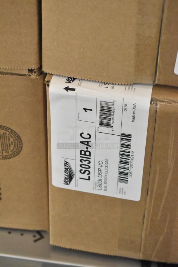 4 Brand New Vollrath LS03IB-AC LidSaver™ 3 In-Counter Lid Dispensers for 3 1/4" - 3 3/4" Lids, in original packaging.