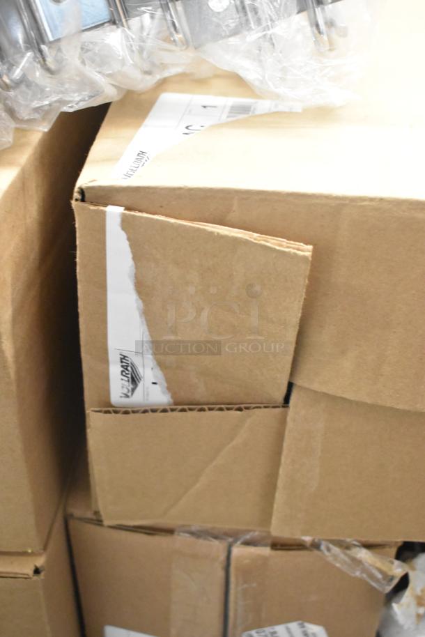 Boxes of new Vollrath LS03IB-AC LidSaver™ 3 in-counter horizontal lid dispensers, visible branding.